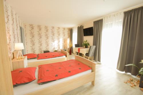 Ένα ή περισσότερα κρεβάτια σε δωμάτιο στο Mainzimmer - Business Apartments