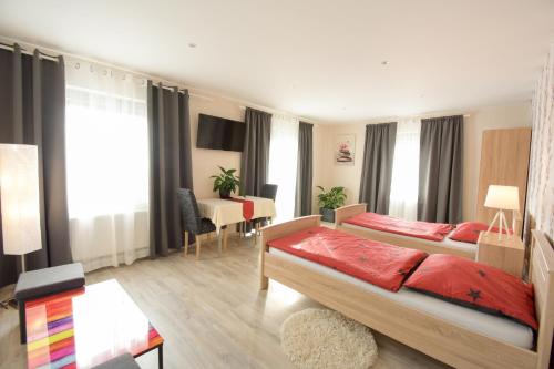 Ένα ή περισσότερα κρεβάτια σε δωμάτιο στο Mainzimmer - Business Apartments