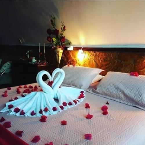 Ένα ή περισσότερα κρεβάτια σε δωμάτιο στο Hotel O Alemão