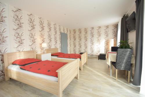 Ένα ή περισσότερα κρεβάτια σε δωμάτιο στο Mainzimmer - Business Apartments
