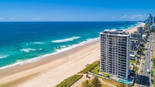 an aerial view of a building and the beach at Golden Sands on the Beach - Absolute Beachfront Apartments in Gold Coast