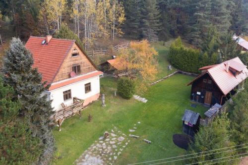 an aerial view of a house with a yard at Chata Horáreň in Smižany