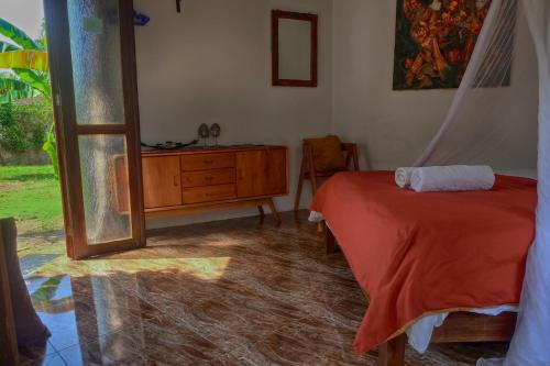 Katil atau katil-katil dalam bilik di Ayu Hotel Karimunjawa