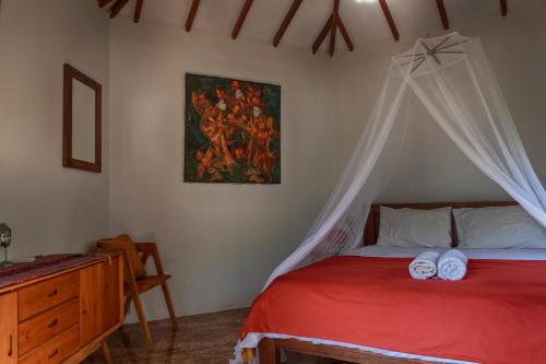 Katil atau katil-katil dalam bilik di Ayu Hotel Karimunjawa