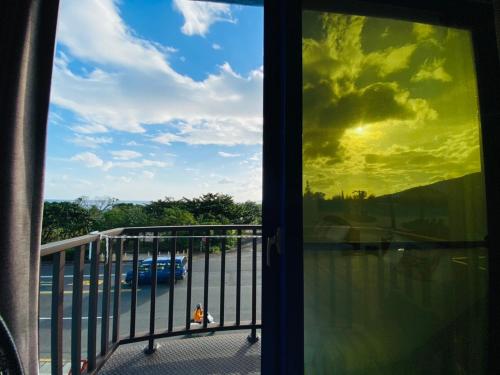 a view from a window of a balcony at Nanwan254 Homestay in Nanwan