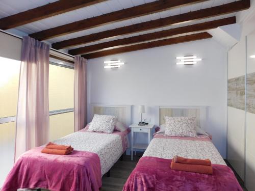 Katil atau katil-katil dalam bilik di El rincon de Maruca