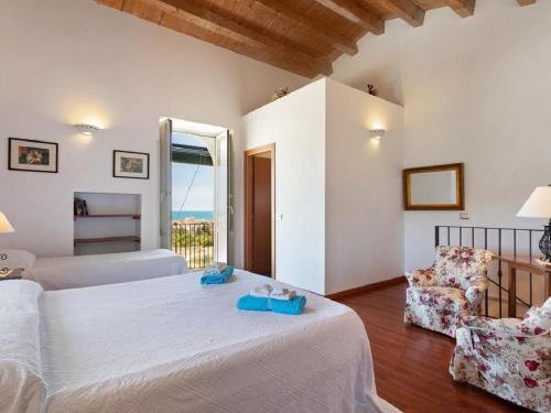 Posteľ alebo postele v izbe v ubytovaní Il Baglio di Kharrub rural guest house