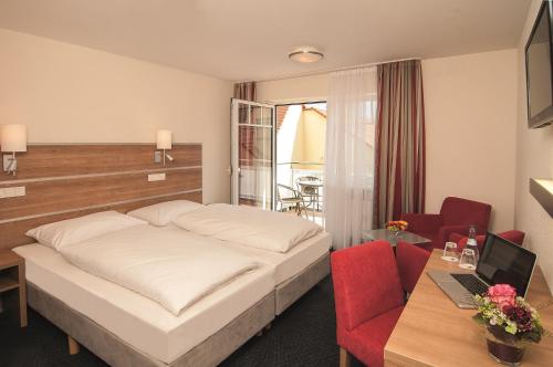 Postel nebo postele na pokoji v ubytování Hotel-Gasthof Rangau