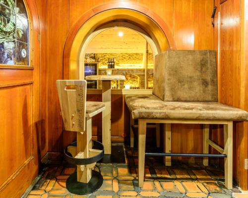 a kitchen with a counter and a table in a room at Landgasthof Bierfriedl in Pruggern