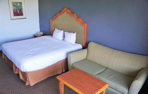 Postel nebo postele na pokoji v ubytování Hotel Elev8