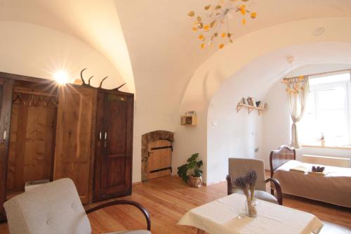 Ένα ή περισσότερα κρεβάτια σε δωμάτιο στο Apartmán Tri Klenby