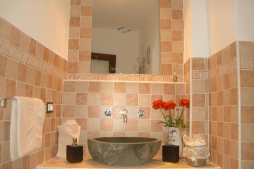 a bathroom with a sink and a mirror at Villa Mont des Oliviers CITRA-8055LT-1805 e 1807 in Sanremo