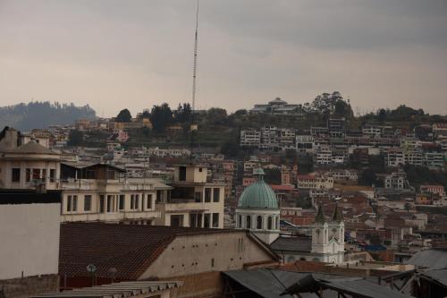 a view of a city with buildings at Adamas House Hotel Boutique in Quito