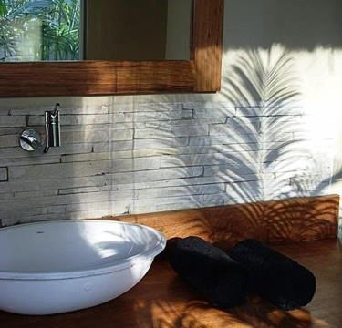 a white bowl on a counter in a bathroom at Kani Boutique Resort in Canavieiras