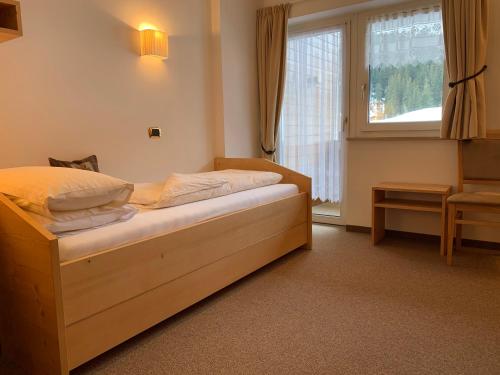 Postel nebo postele na pokoji v ubytování Hotel Valpudra