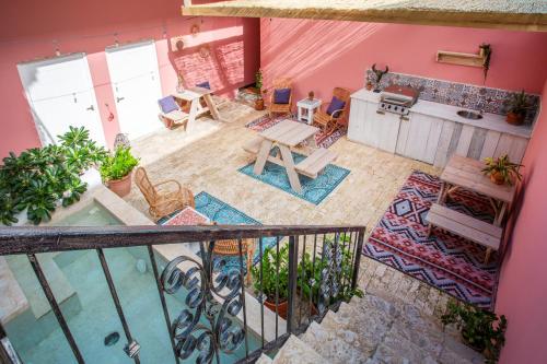 an overhead view of a living room with a hot tub at BOHO Bohemian Boutique Hotel in Willemstad