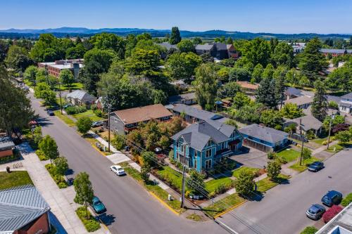 an aerial view of a residential neighborhood with a blue house at MaMere's Guest House in Monmouth