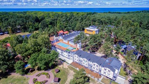 Apartamenty Poddąbek- basen kryty, sauna, animacje dla dzieci , małpi gaj, baseny na dachu