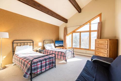 Postel nebo postele na pokoji v ubytování Breakaway West - Studio, 2,3 Bedrooms by Vail Realty