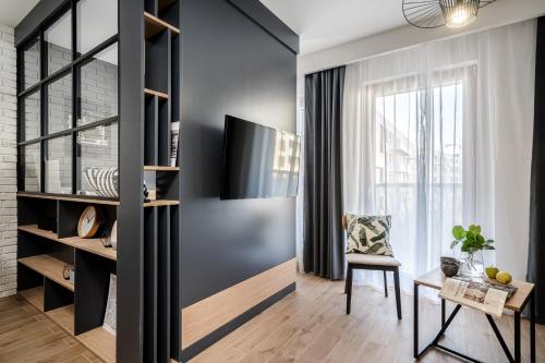 TV a/nebo společenská místnost v ubytování Dream4You Apartments