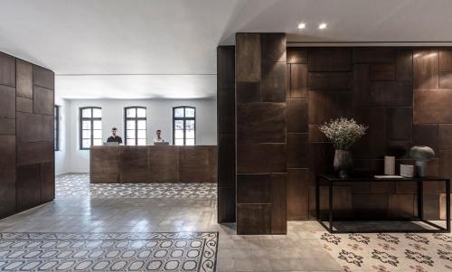 a lobby with wood paneling and a reception desk at Sofia Hotel Sea Of Galilee in Tiberias