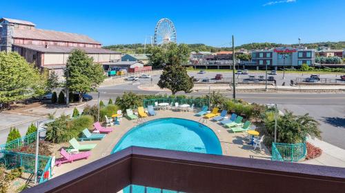 a beach with a pool and a balcony at Margaritaville Island Inn in Pigeon Forge