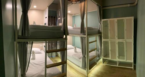 Voodi või voodid majutusasutuse Busket Hostel toas