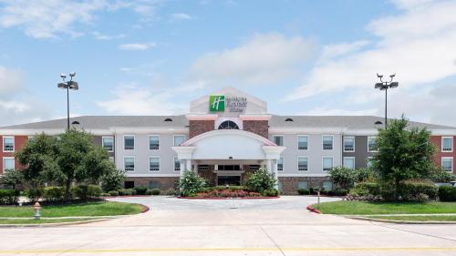 a rendering of the front of a hotel at Holiday Inn Express Hotel and Suites Conroe by IHG in Conroe