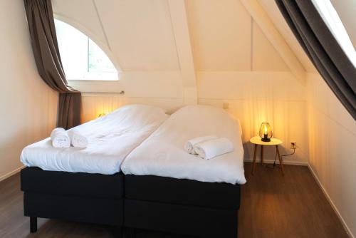 Un pat sau paturi într-o cameră la Resort Citta Romana