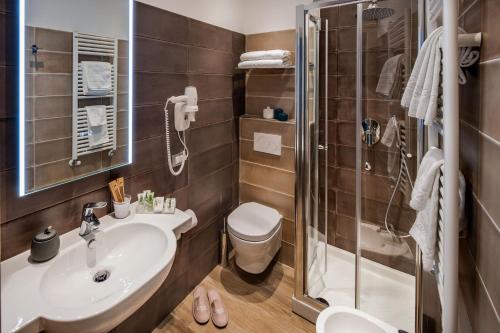 Ένα μπάνιο στο Hotel Villa Ida family wellness