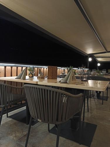 a dining room with a table and chairs at Winklerhof in Parcines