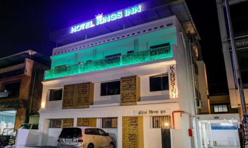 a building with a sign on top of it at Treebo Kings Inn Vashi in Mumbai