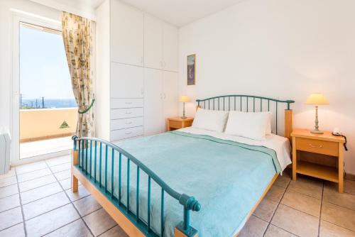 Ένα ή περισσότερα κρεβάτια σε δωμάτιο στο Villa Barite