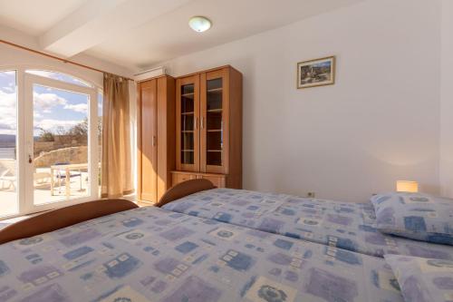 Ένα ή περισσότερα κρεβάτια σε δωμάτιο στο Apartment Aria with private heated pool