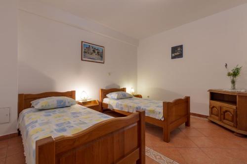 Ένα ή περισσότερα κρεβάτια σε δωμάτιο στο Apartment Aria with private heated pool