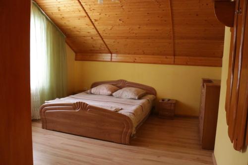 Säng eller sängar i ett rum på Karpatskyi Maetok