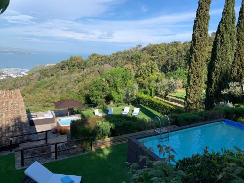 The swimming pool at or close to Villaflair - Design Villa Porto Ercole