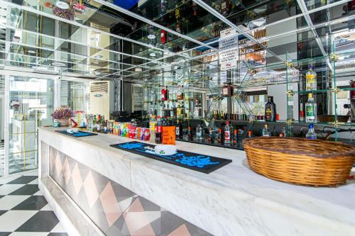a bar with a wicker basket on a counter at ICandy Sol in Malia