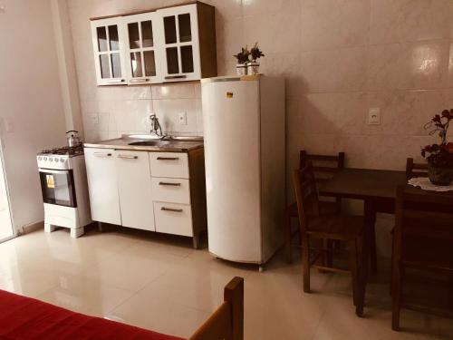 Una cocina o zona de cocina en Residencial Vila Sassari
