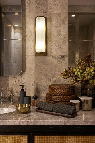a bathroom counter with a sink and a mirror at Root Redrock Yalıkavak in Yalıkavak