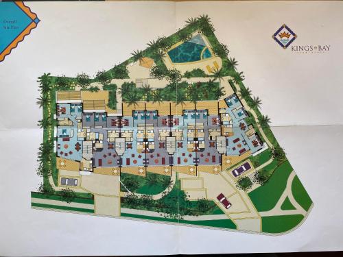 a floor plan of a villa on a wall at Kings Bay Apartments in Caloundra