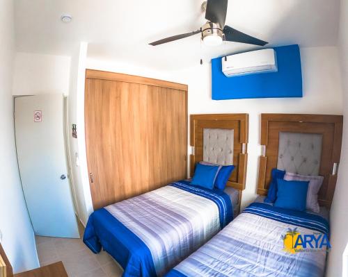 Ліжко або ліжка в номері Disfruta Vallarta, lindo departamento, gran ubicación alberca, nuevo