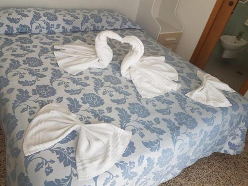 Hotel Zurigoにあるベッド