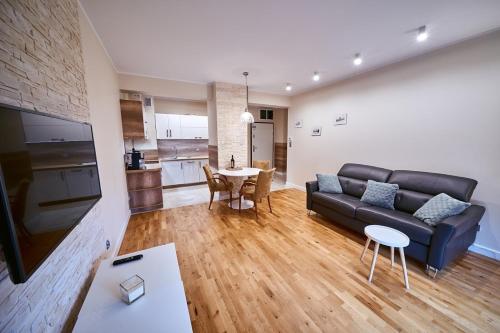 Η κουζίνα ή μικρή κουζίνα στο LAGUNA Apartament 23 Willa Maria