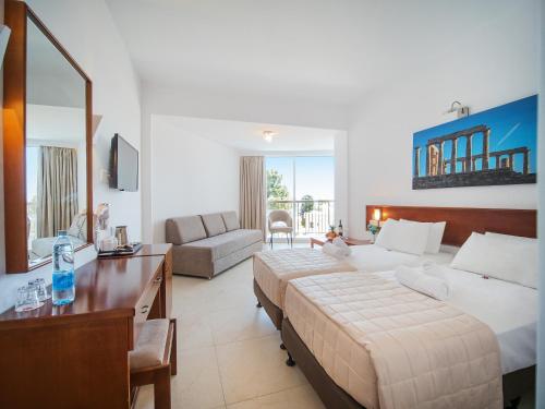 Postel nebo postele na pokoji v ubytování Avlida Hotel
