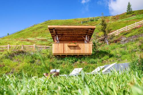 a wooden structure on top of a hill at Chalet Stern in Vipiteno