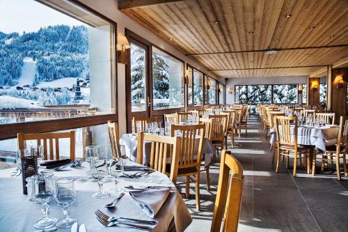 
Restaurant ou autre lieu de restauration dans l'établissement Hotel Alpen Roc
