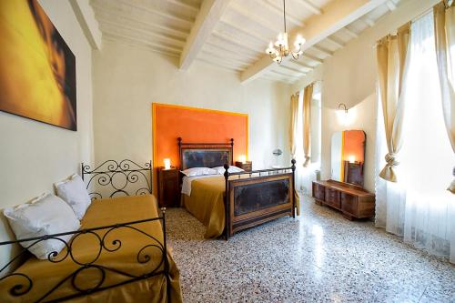 Posteľ alebo postele v izbe v ubytovaní Spacious Apartment with City View in Foiano della Chiana 125 m²