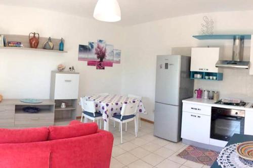 A kitchen or kitchenette at One bedroom apartement with garden and wifi at Civitanova Marche