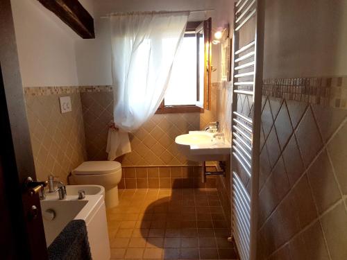 A bathroom at 3 bedrooms villa with private pool jacuzzi and enclosed garden at Le Scotte